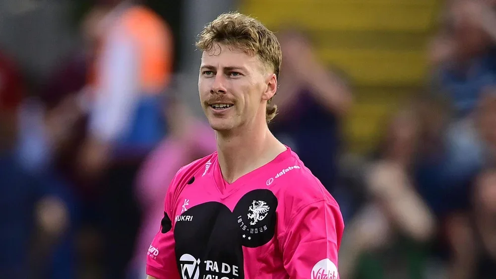 Riley Meredith standing on the pitch during a T20 Blast match for Somerset in 2025